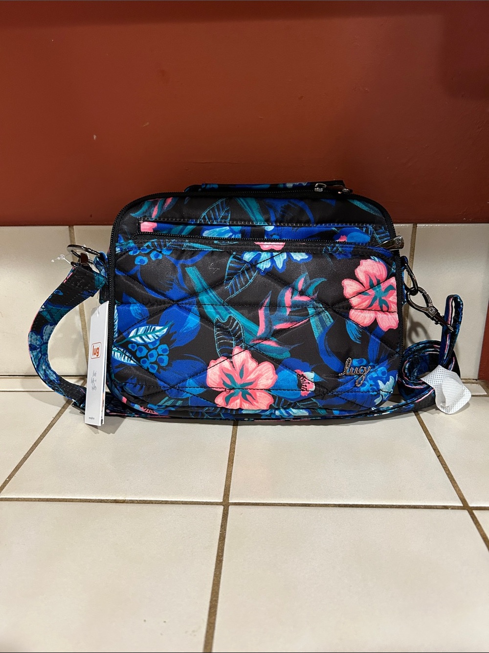 Lug bag Roundabout XL Crossbody with Blue and Pink Floral Design
